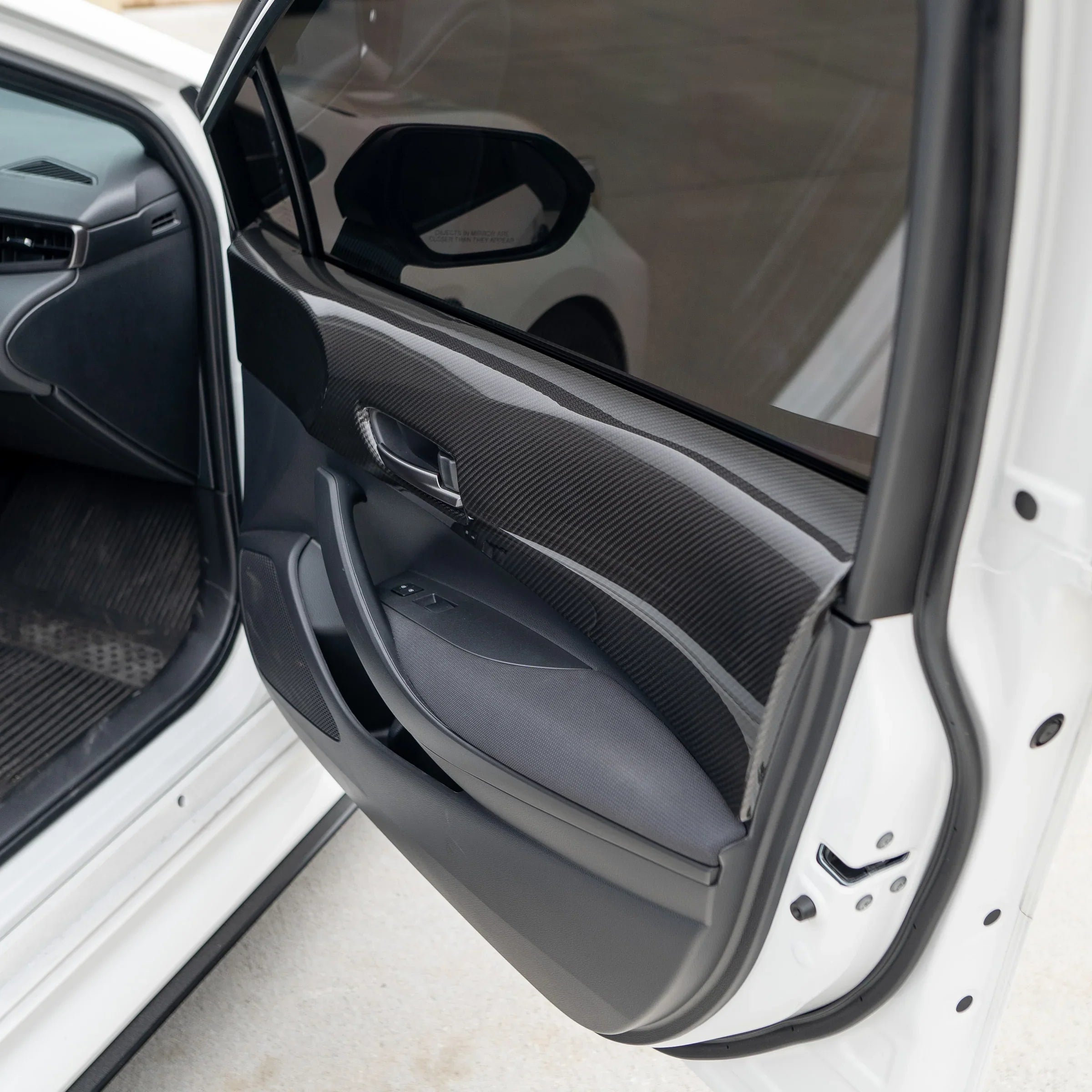 FloKraft Dry Carbon Fibre Front Inner Door Trim Covers for Toyota Corolla Hatch (E210) 2019-2026 & GR Corolla 2022-2026