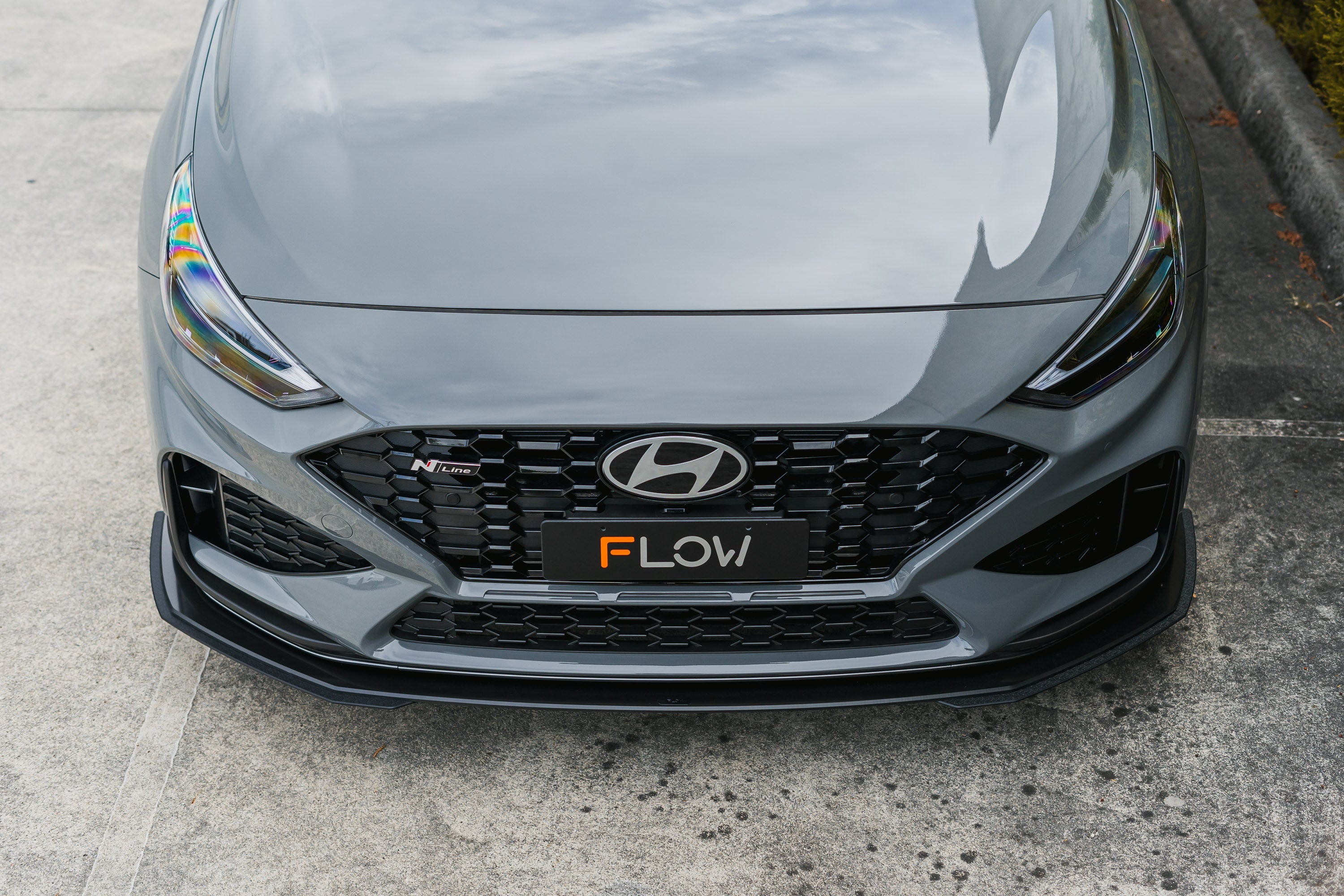 i30N-Line Hatch PDe.V6 FL 2024+ Front Lip Splitter Extensions (Pair)